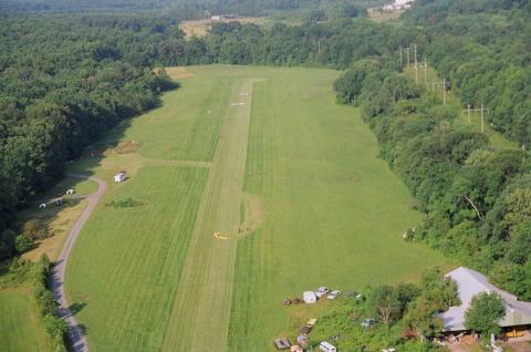 Aerial view of airport AviAcres (3VA2) looking SW