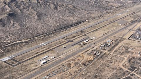 An aerial view of San Carlos Apache Airport (P13) taken from the northeast looking southwest, late morning.