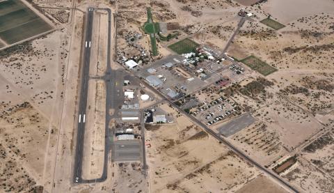 An aerial view of Eloy Municipal Airport (E60) from the southwest