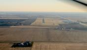aerial pic of Morris Municipal Airport C09, turning 1 mile final on Rwy 18