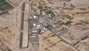 An aerial view of Eloy Municipal Airport (E60) from the southwest