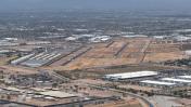 An aerial view of Chandler Municipal Airport (KCHD) from the southwest