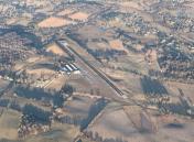 aerial photo of Monroe County KMNV (Madisonville) from 4500', 1nm WSW, winter
